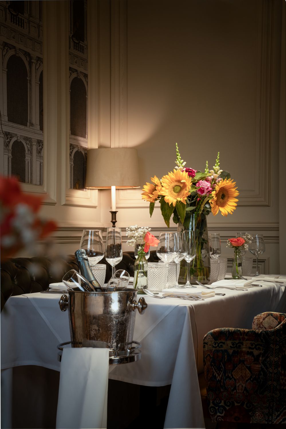 private dining table setup in the monkey room with champagne bucket
