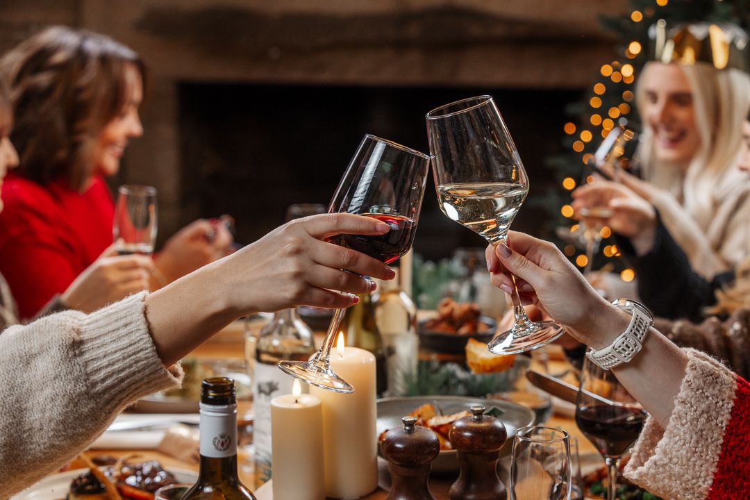 Cheersing over the Christmas dining table